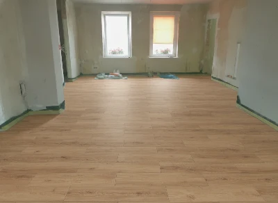 Wirtualna wizualizacja AI - Premium Floor Dąb Karmelowy 99724 panel winylowy 153.2x19.2x0.6  na podłodze