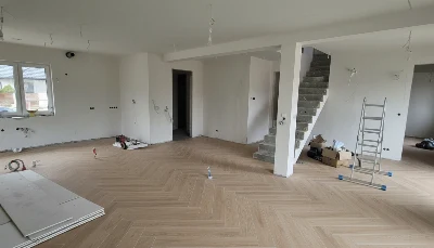 Wirtualna wizualizacja AI - Barlinek Dąb Lniany panel winylowy SPC jodełka ze zintegrowanym podkładem 63.95x12.79x0.6 (DP5000026)  na podłodze